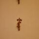 A pair of antique brass wall sconces.