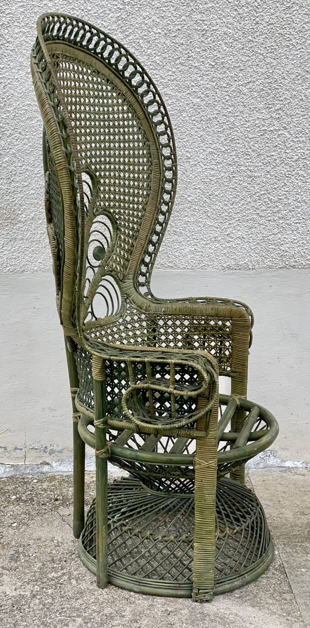 Vintage 1970s green patinated peacock rattan armchair