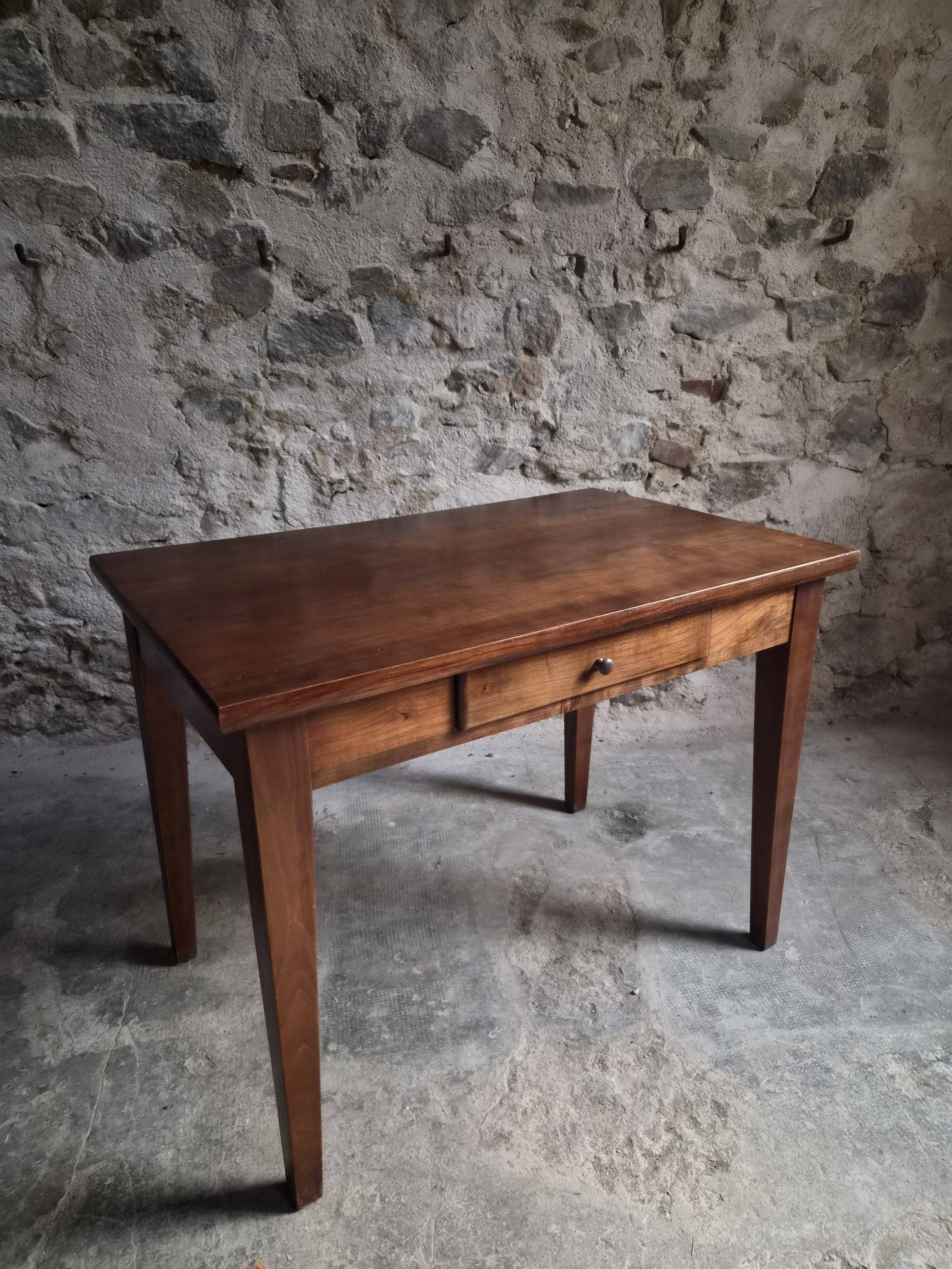 Old French table in cherry wood with bistro chair, circa 1900–1930.