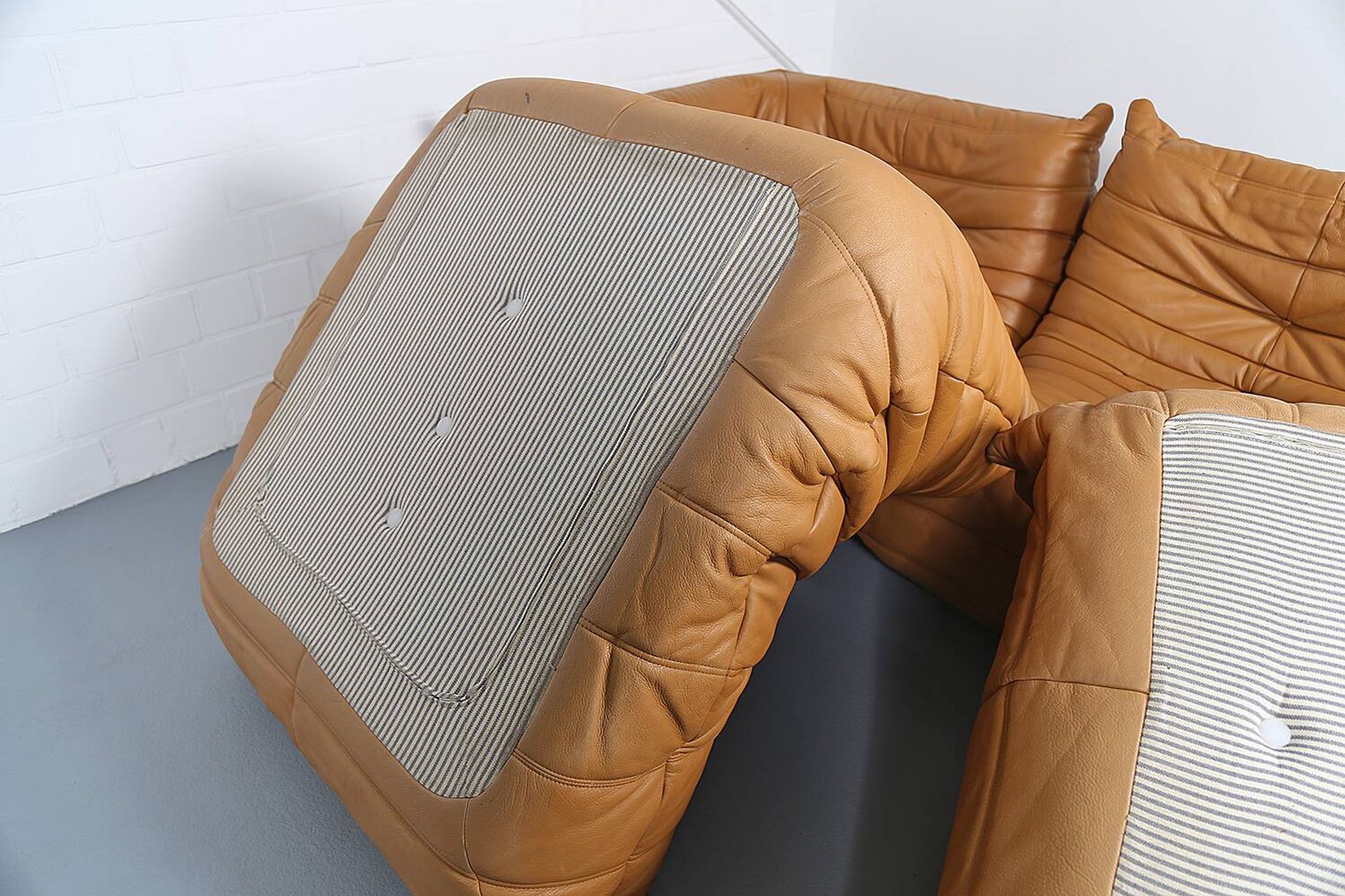 Cognac leather Ligne Roset Togo set from 2010 designed by Michel Ducaroy