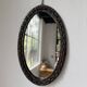 Miroir brutaliste ovale « chaine » 1950