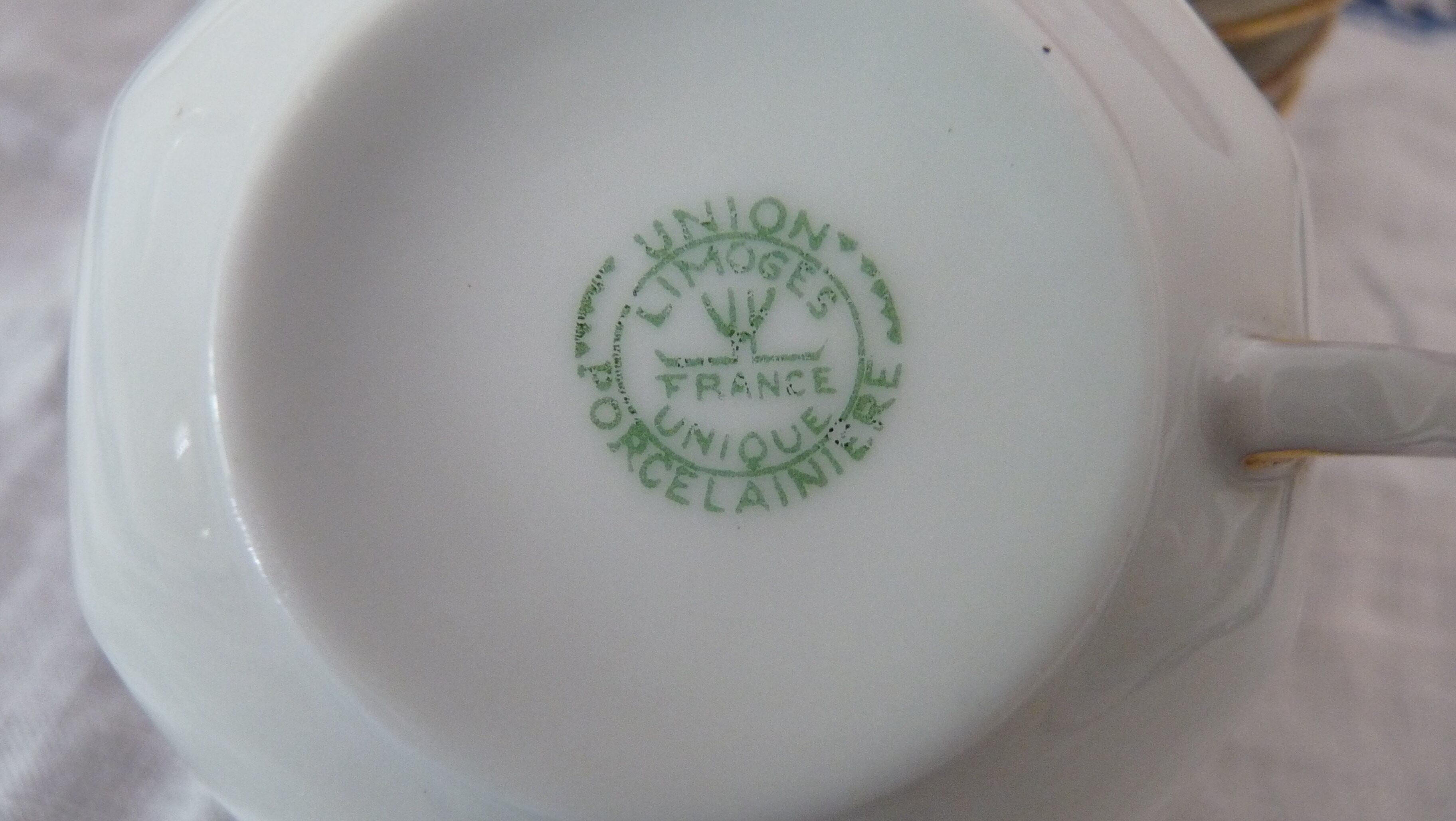 6 cups and white porcelain cups of Limoges