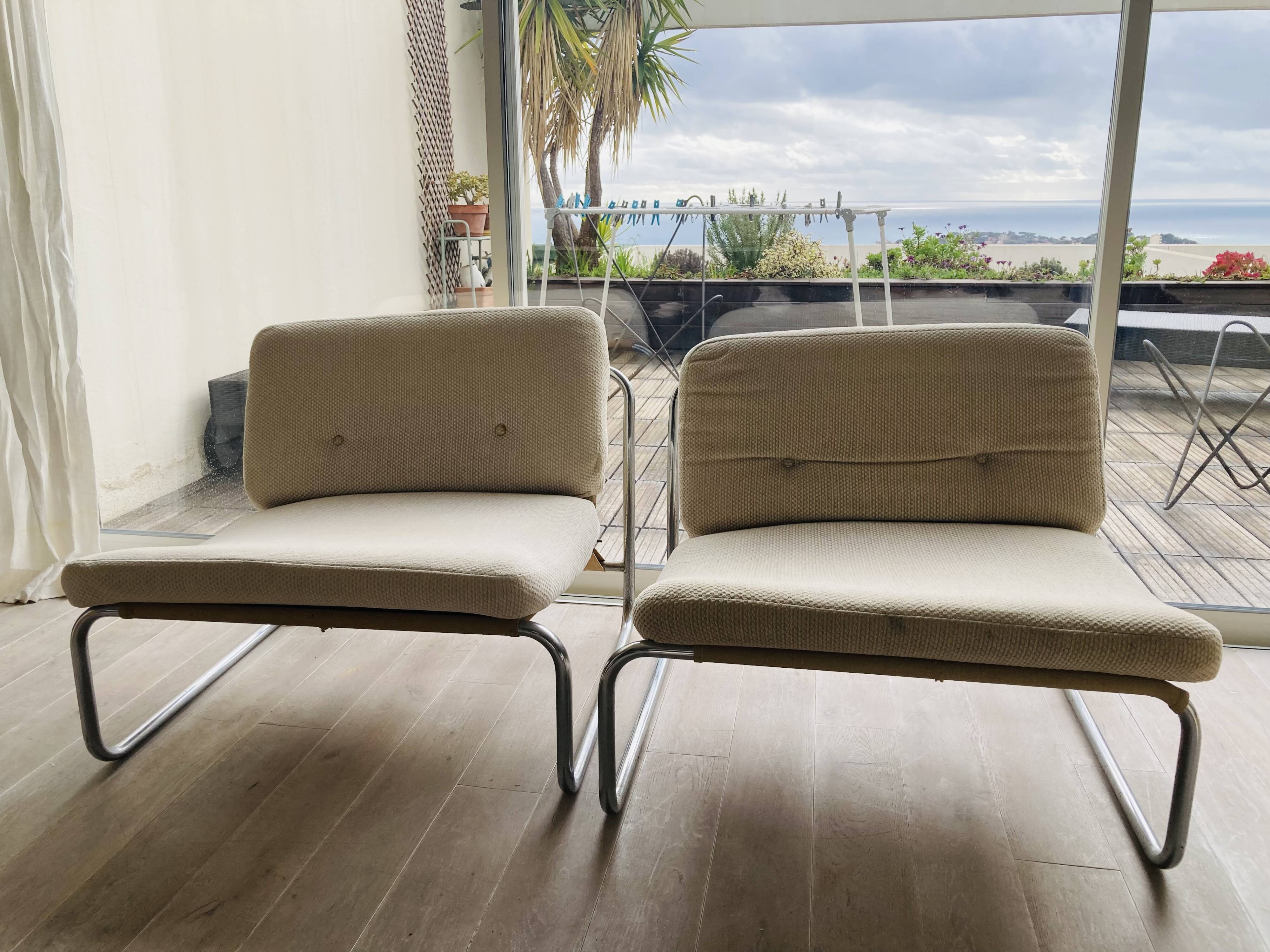 Pair of vintage lounge chairs DUX International from the 60s-70s.