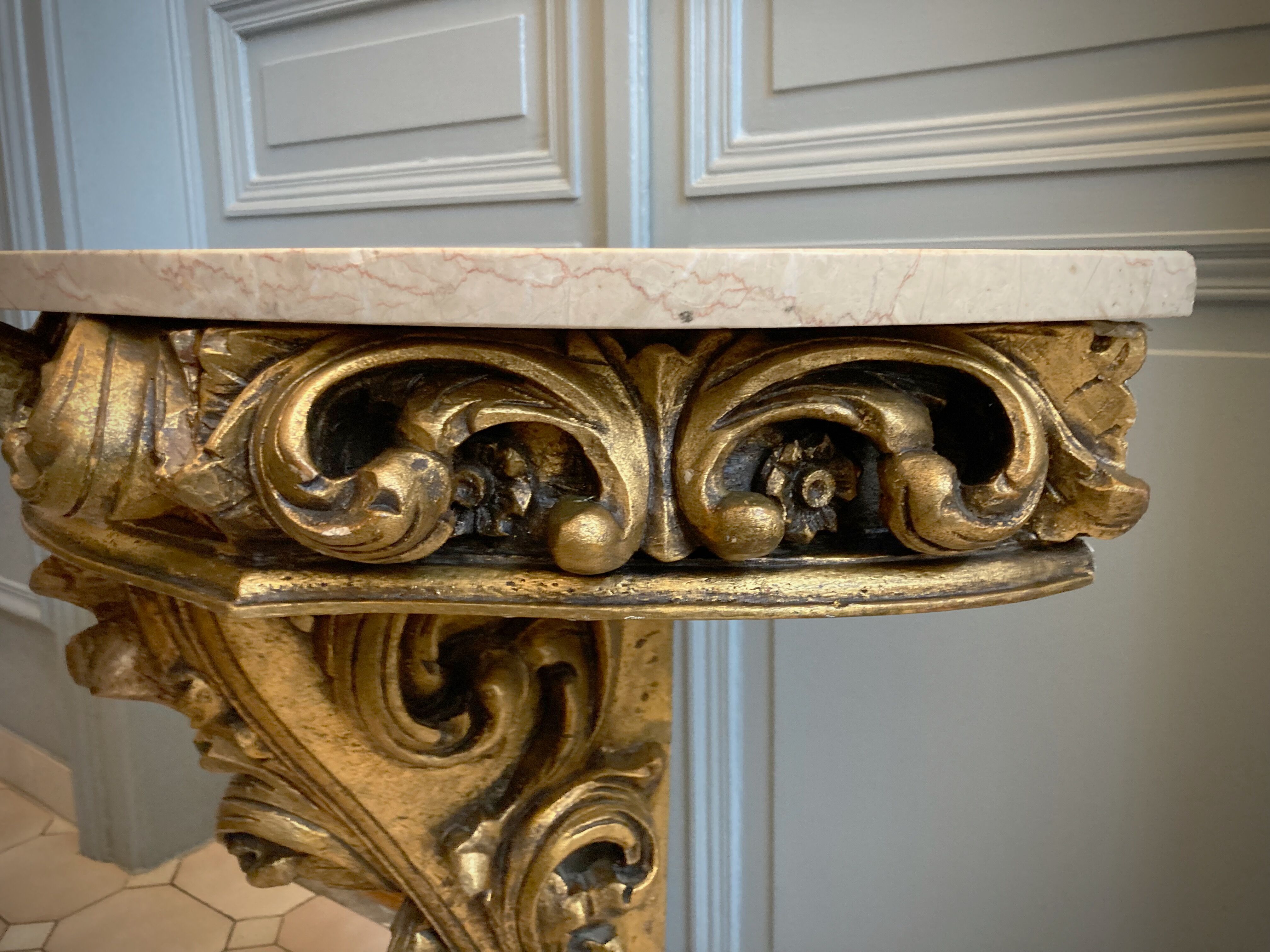 Carved wooden and marble console