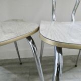 Paire de chaises en formica effet veines de bois et chant doré