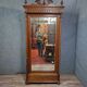 Neo-Gothic mirrored wardrobe in solid walnut – Late 19th century