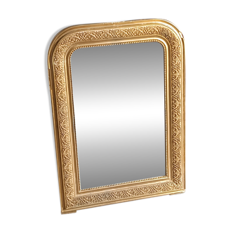 antique mirror in wood and gilded stucco