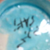 Nice oriental vase, black geometric patterns on blue background, vintage