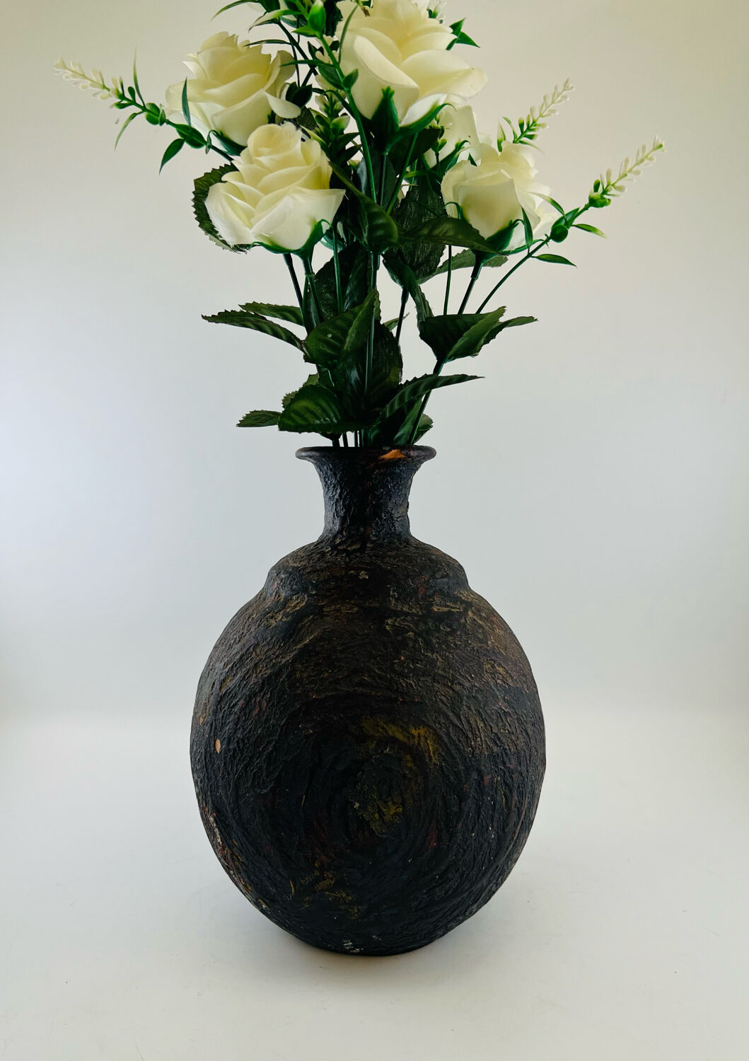 Iridescent black ball vase