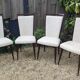 Set of 4 Vintage Mid-Century Modern Chairs with tapered metal legs.