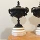 Bronze fireplace garnitures with marble base depicting leaves.
