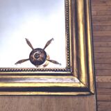 Old large Louis Phillipe mirror, gilded with gold leaf - Emilien"