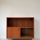 Vintage wooden cabinet with sliding doors