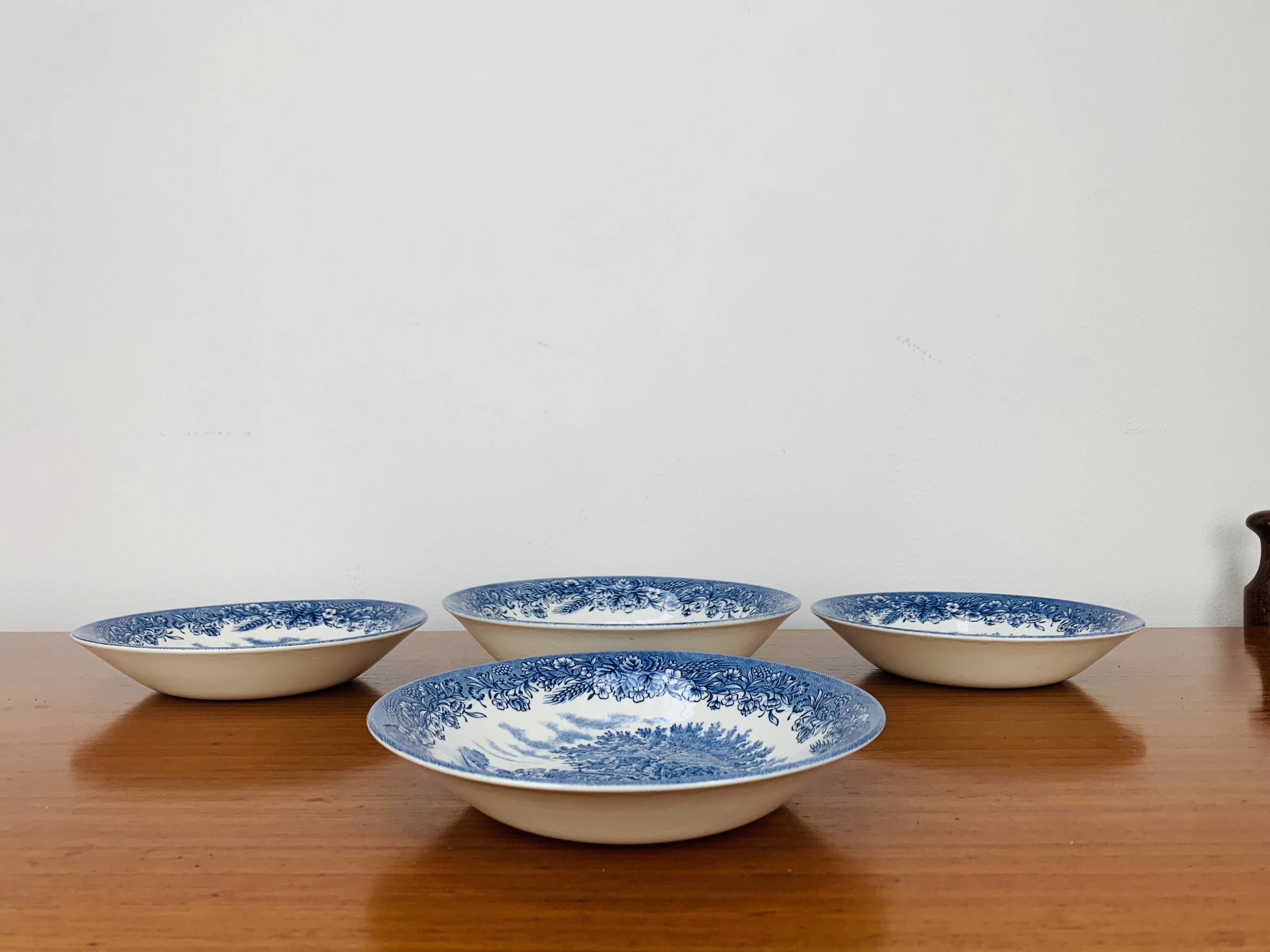 4 Churchill English ironstone soup plates, blue