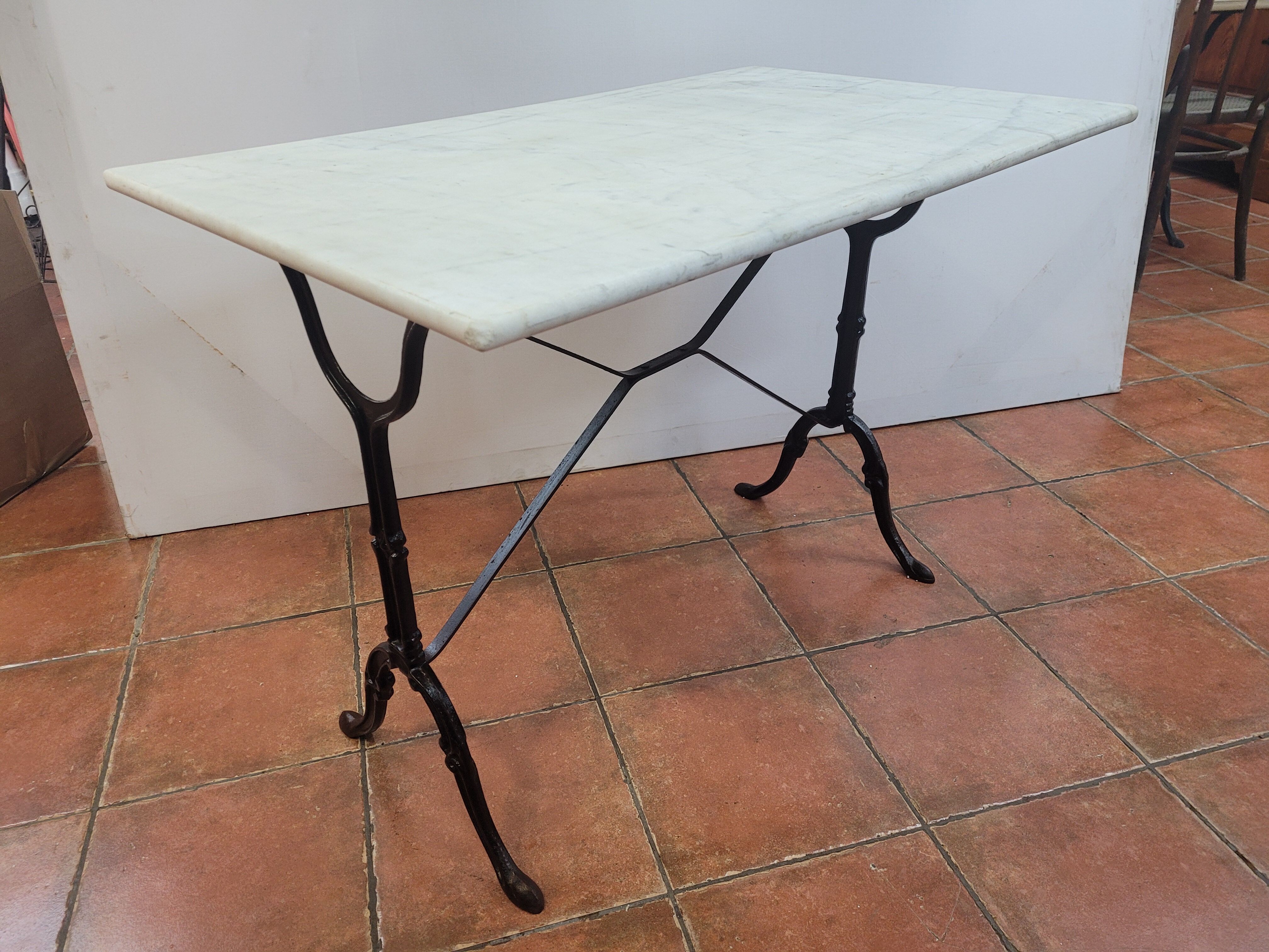 Bistro table base cast iron over marble