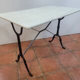 Table de bistrot piètement fonte dessus marbre