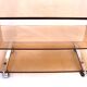 Table basse roulante design en plexiglas