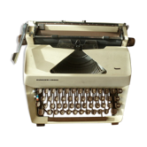 Typewriter and Facit 1620 vintage brown leather suitcase