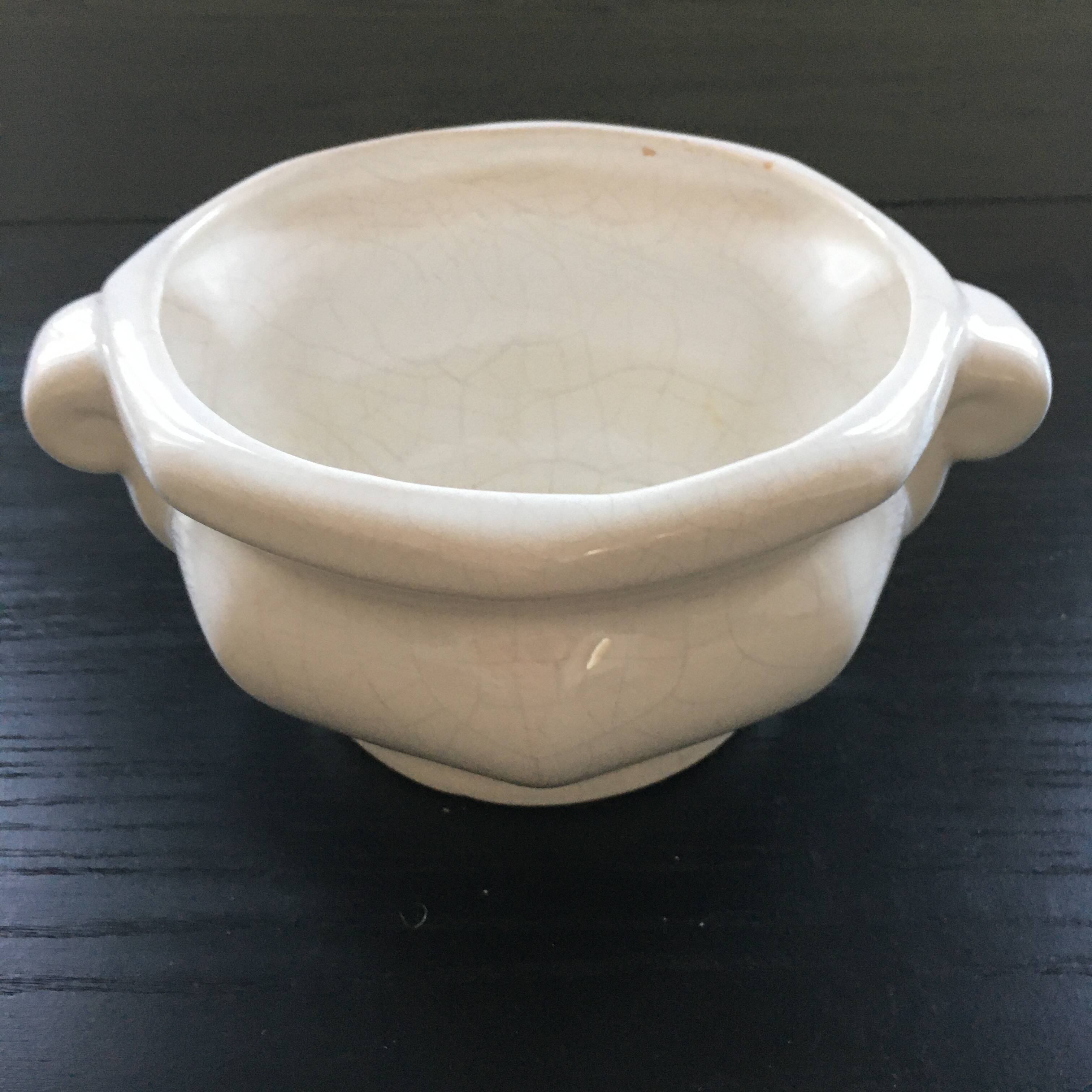 Cracked earthenware planter