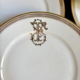 6 flat plates in gold porcelain monogrammed "F"