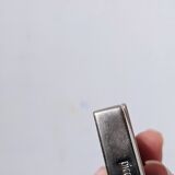 Old lighter new picoflam new condition in its small pocket leather case some stains on the et
