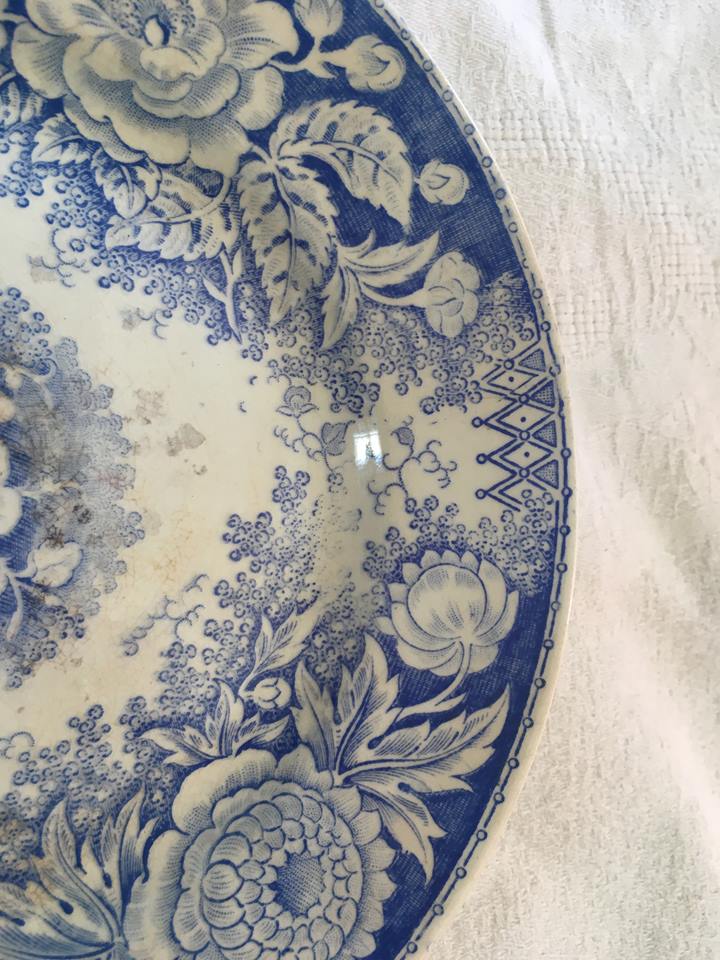 Together seven dessert plates mismatched in blue.