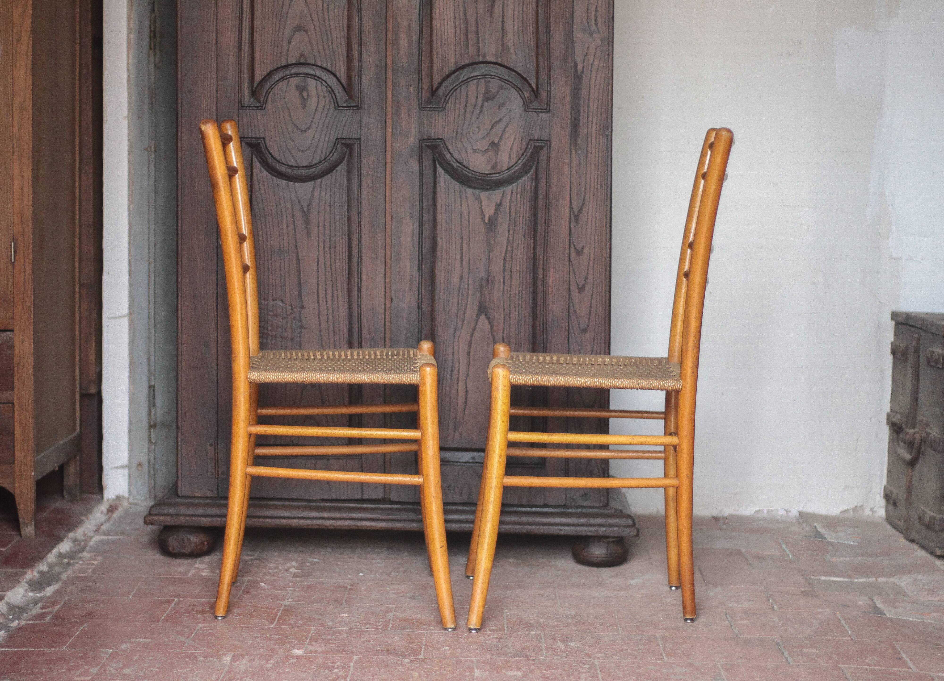 Pair of wooden chairs with vintage rope seats, vintage rope chairs