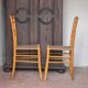 Pair of wooden chairs with vintage corded seats, vintage corded chair.