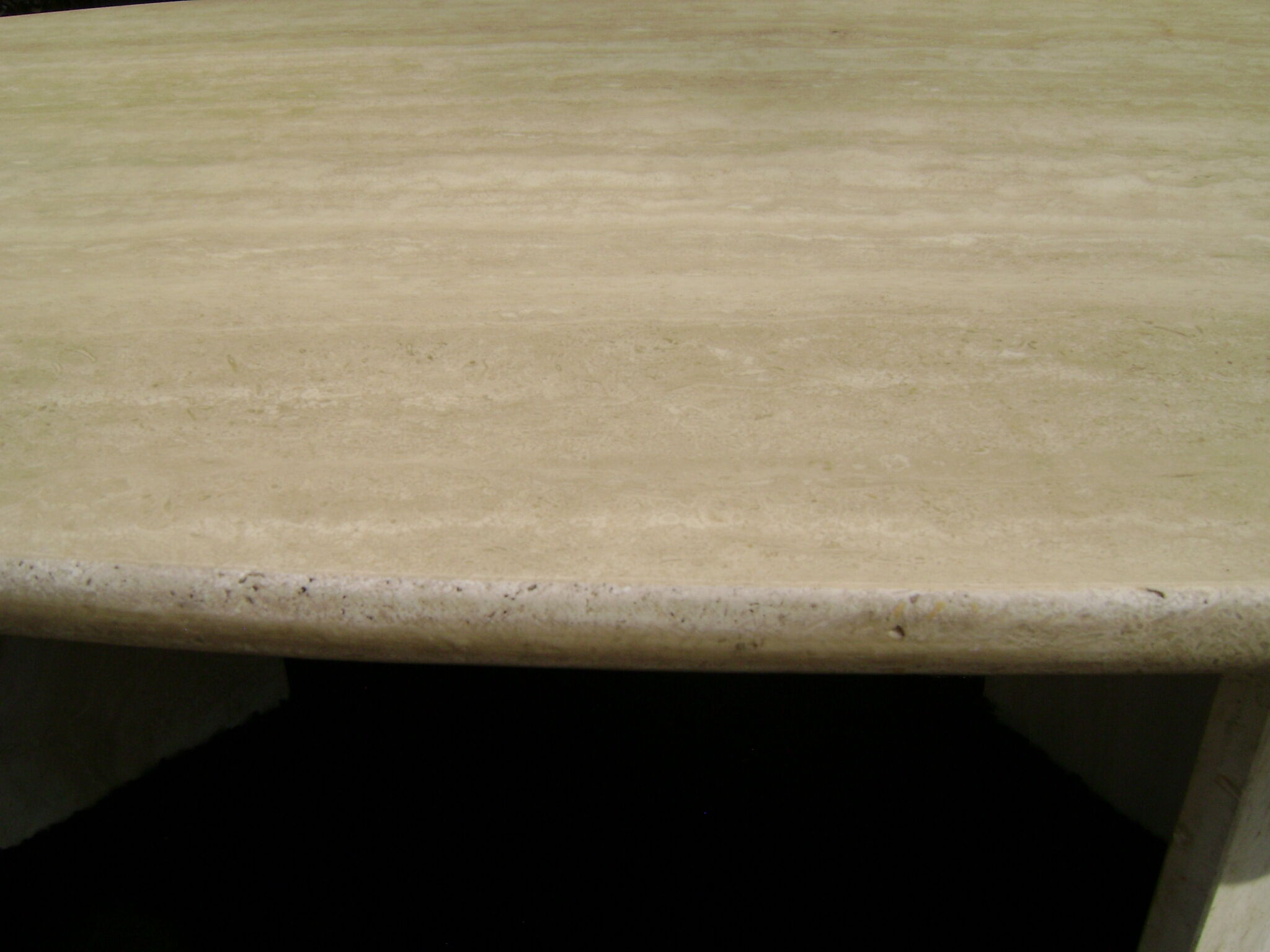 Oval coffee table in travertine italy from the 1970s