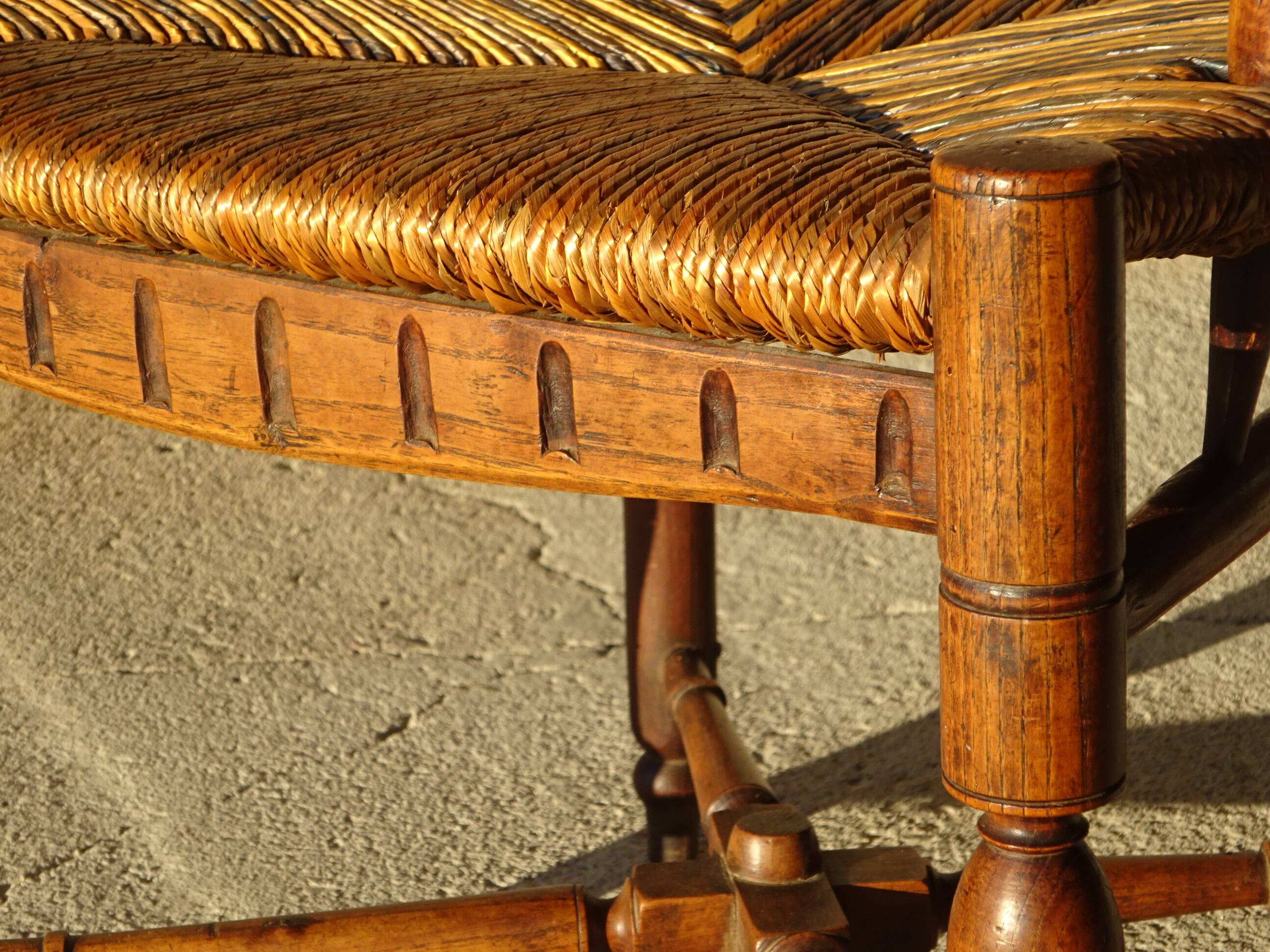 old armchair with leather armrests, from the 19th century