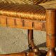 old armchair with leather armrests, from the 19th century