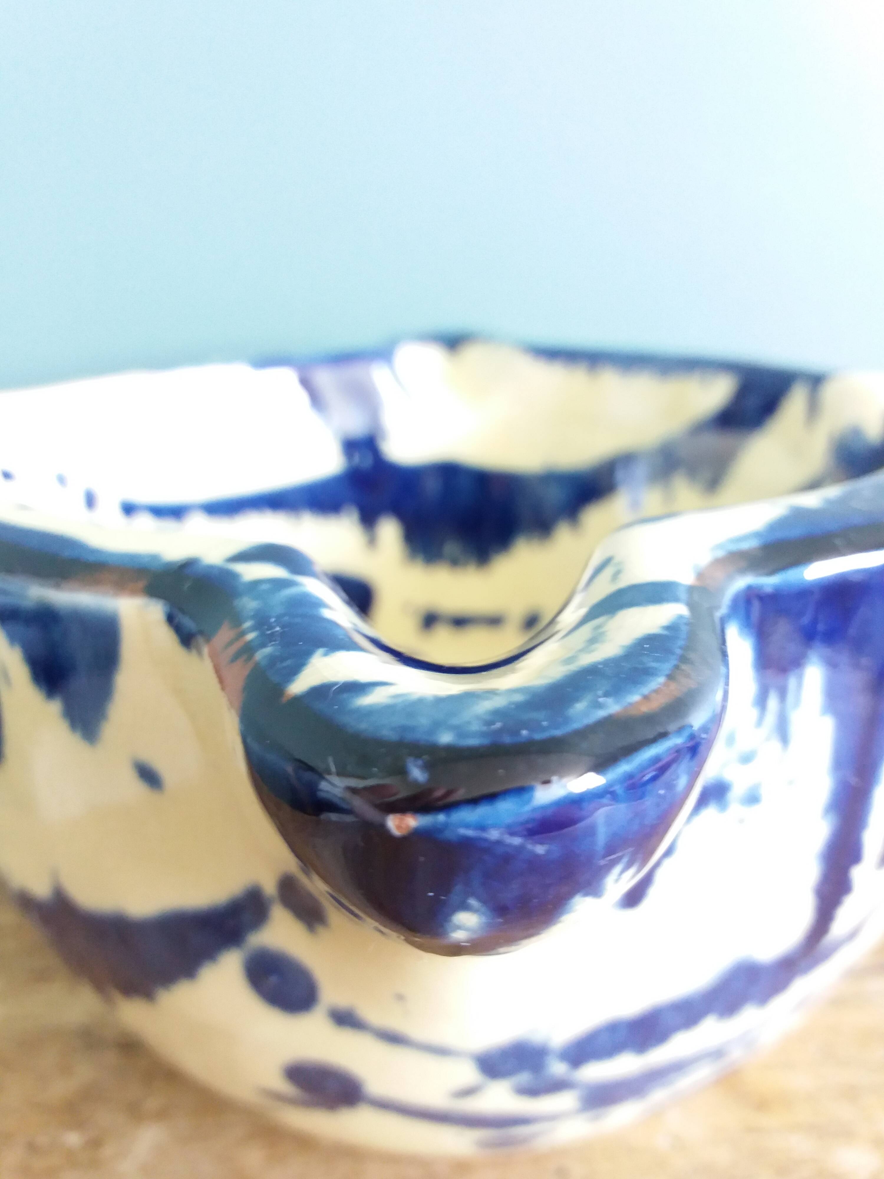 Glazed terracotta mortar and wooden pestle