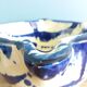 Glazed terracotta mortar and wooden pestle