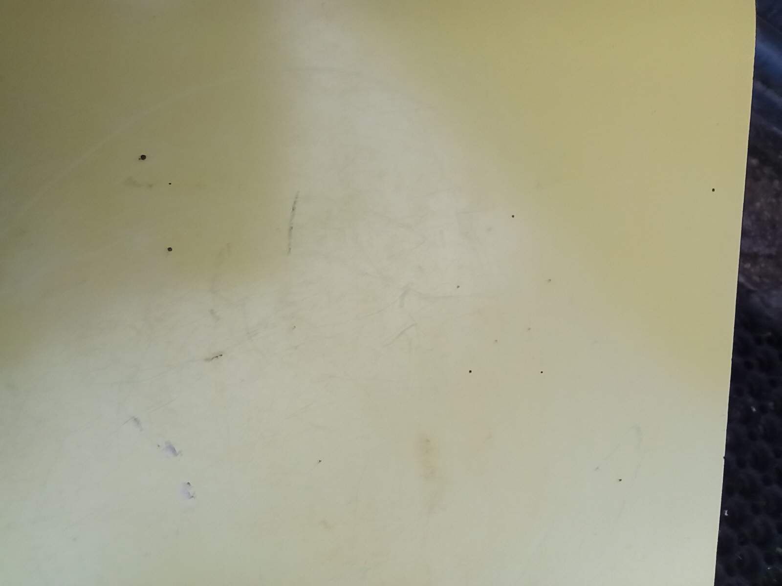 Oak stool and yellow formica