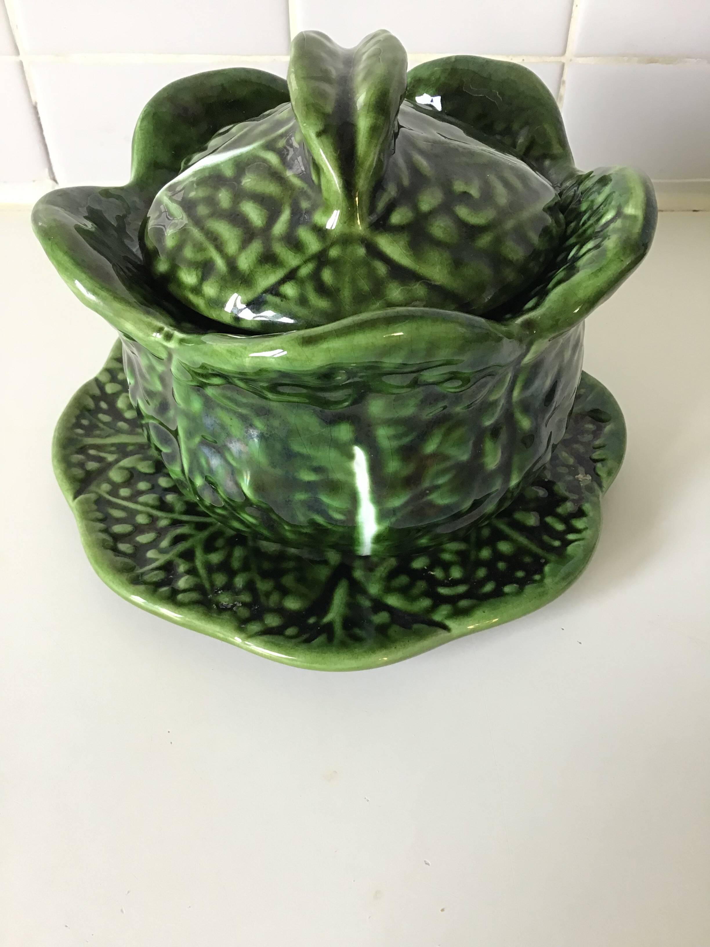 1 small bowl of cabbage with its plate underneath