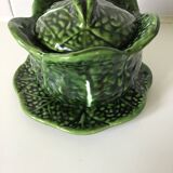 1 small bowl of cabbage with its plate underneath