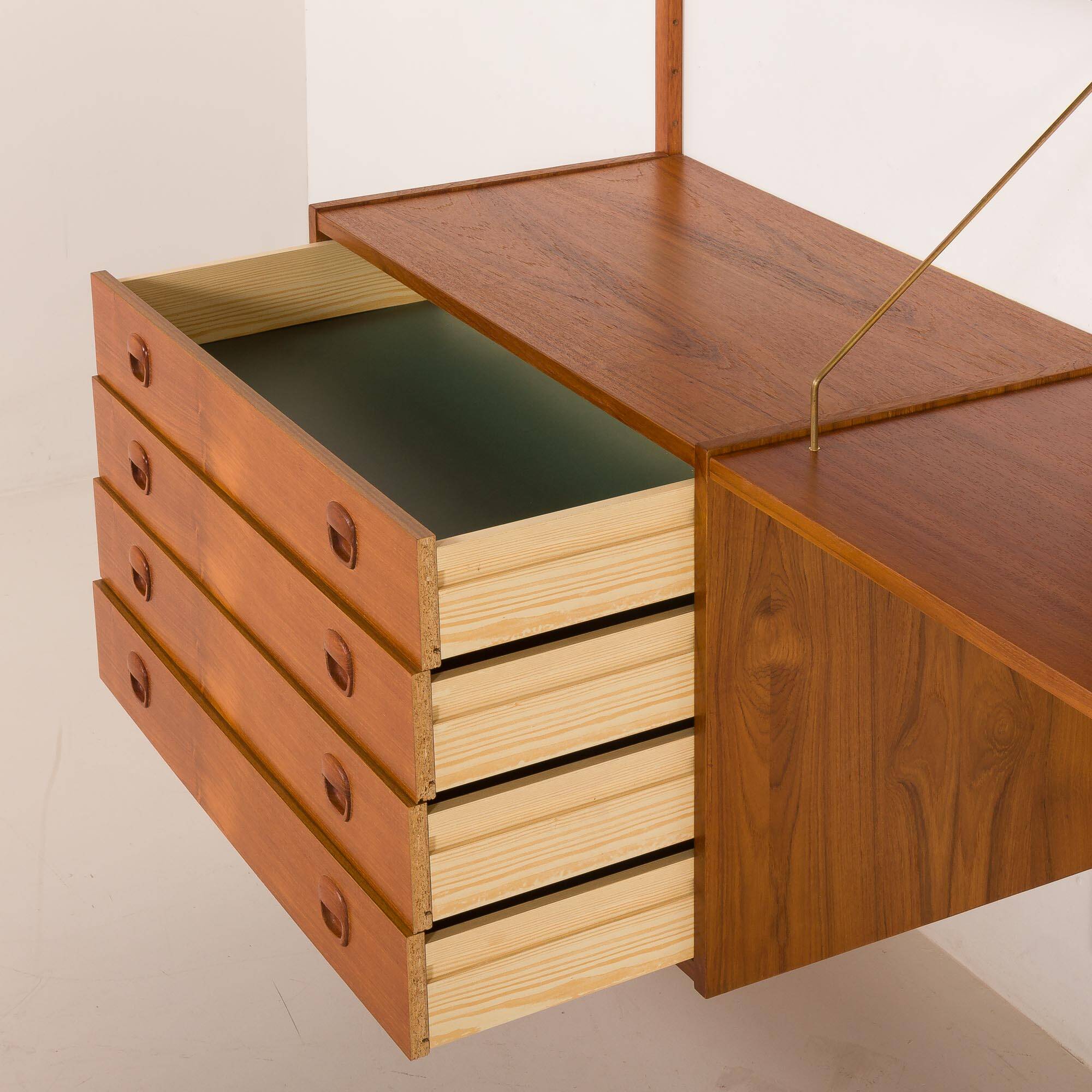 Danish teak wall unit in the style of Cadovius, Sorensen with a lamp, 1970s