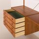 Danish teak wall unit in the style of Cadovius, Sorensen with a lamp, 1970s