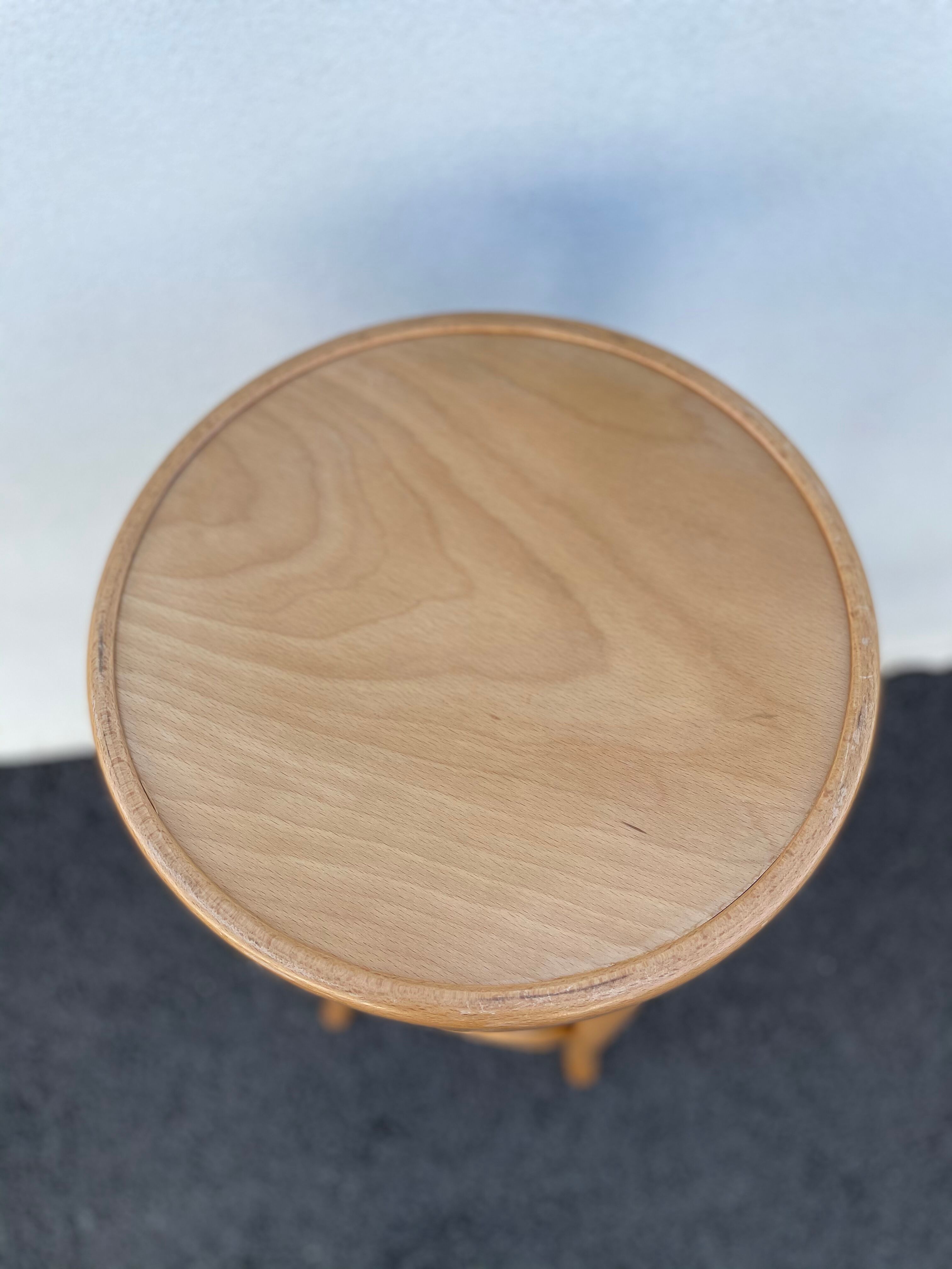 Curved wooden bar stool