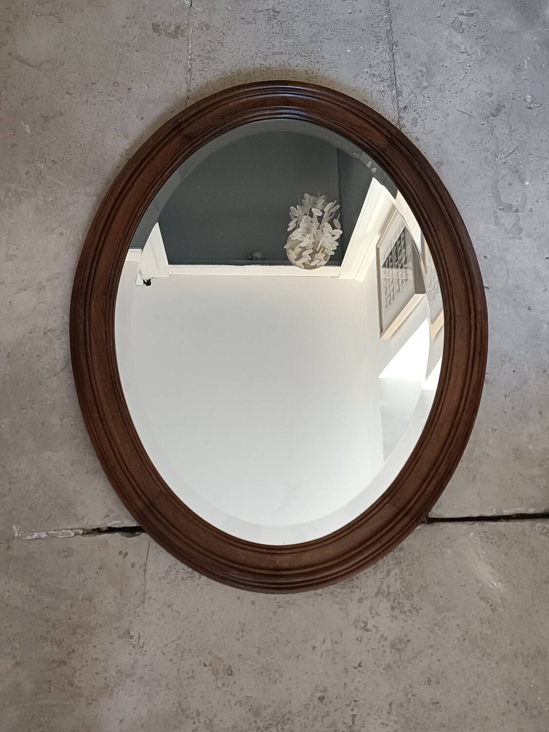 Antique oval beveled mirror