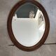 Antique oval beveled mirror