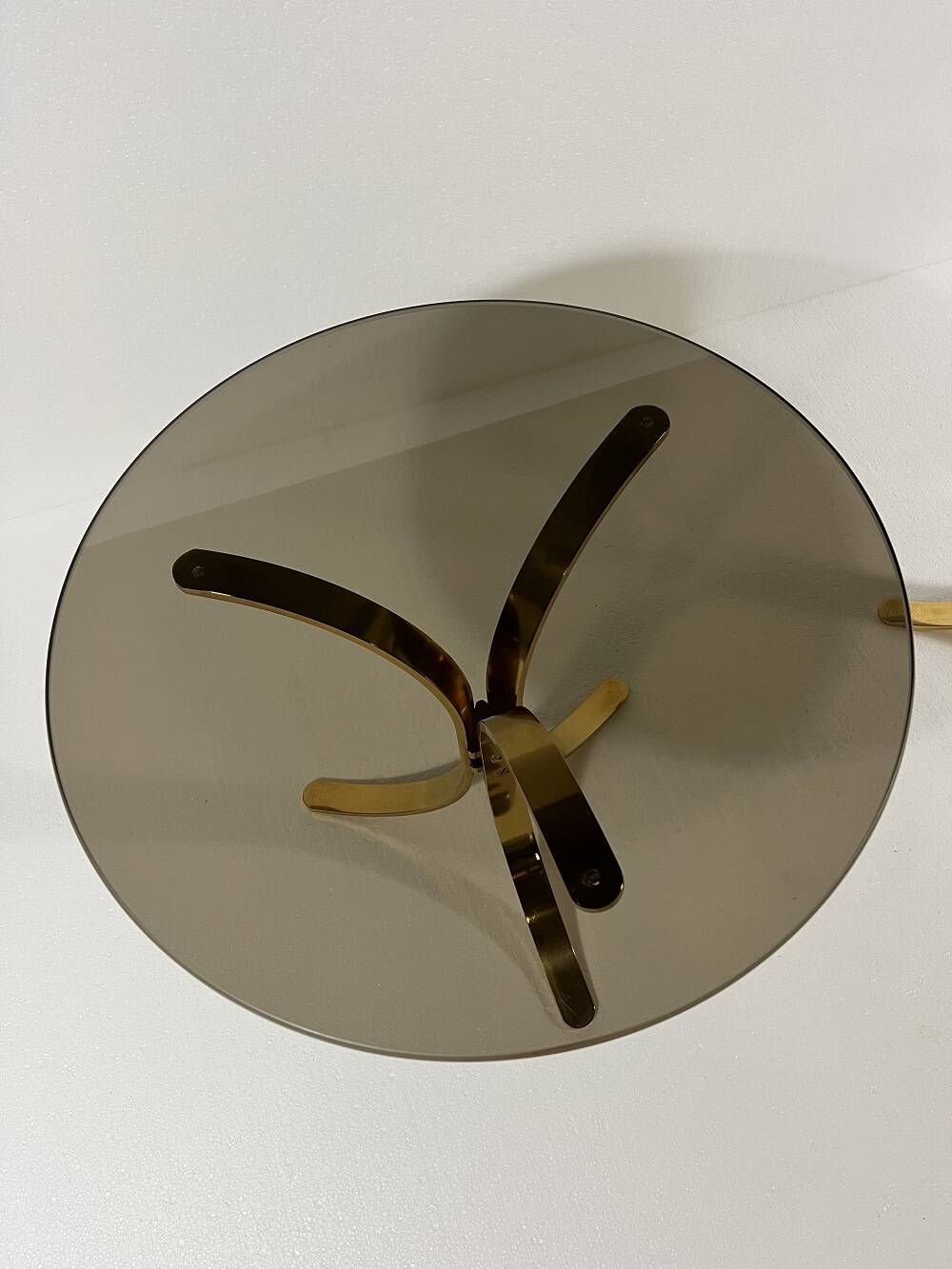 Brass and smoked glass side tables from the 1960s.