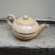 Former breakfast service at the earthenware bed with tray
