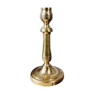 Chiseled brass candle holder