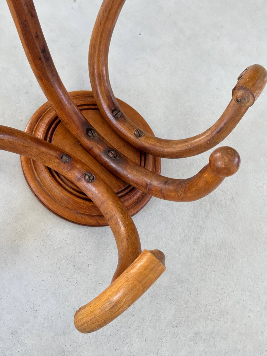 Pair of curved wooden coat racks or hooks from the 1900s