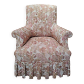 Antique armchair fully restored with brass wheels.