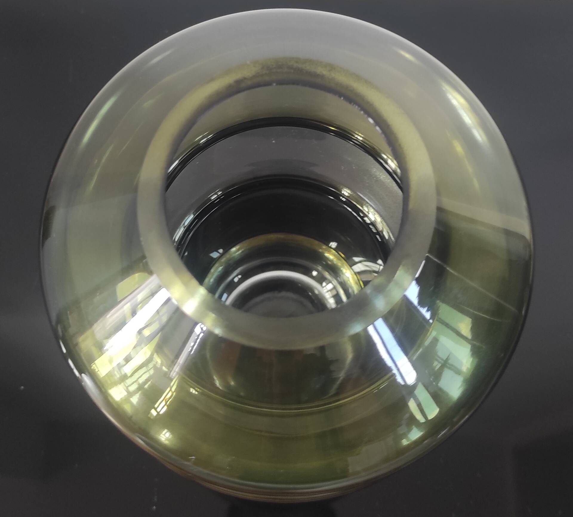 Sculptural vase in olive green glass