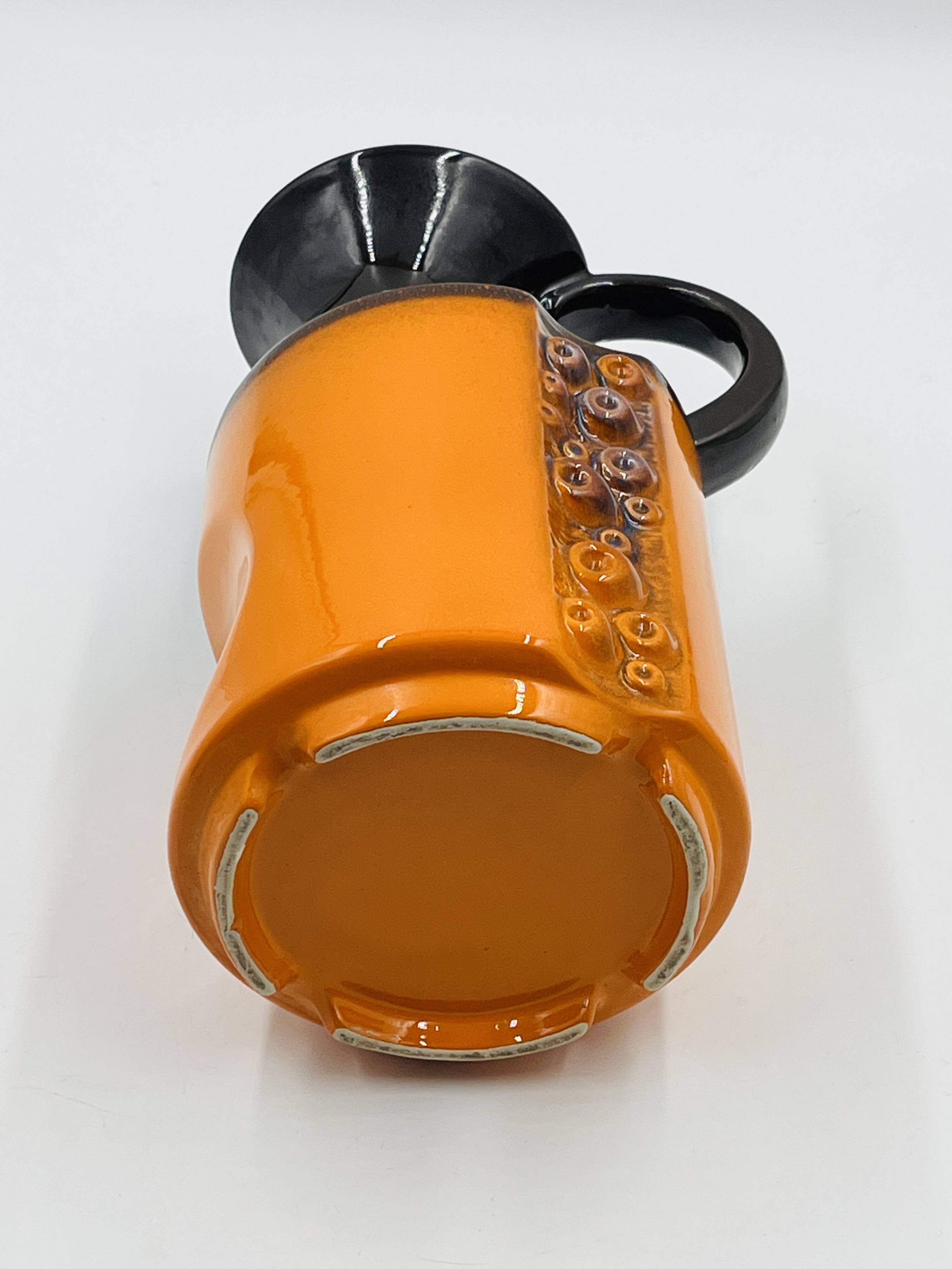 Modernist vase design, orange ceramic with relief cabochons from the 1970s.