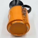 Modernist vase design, orange ceramic with relief cabochons from the 1970s.