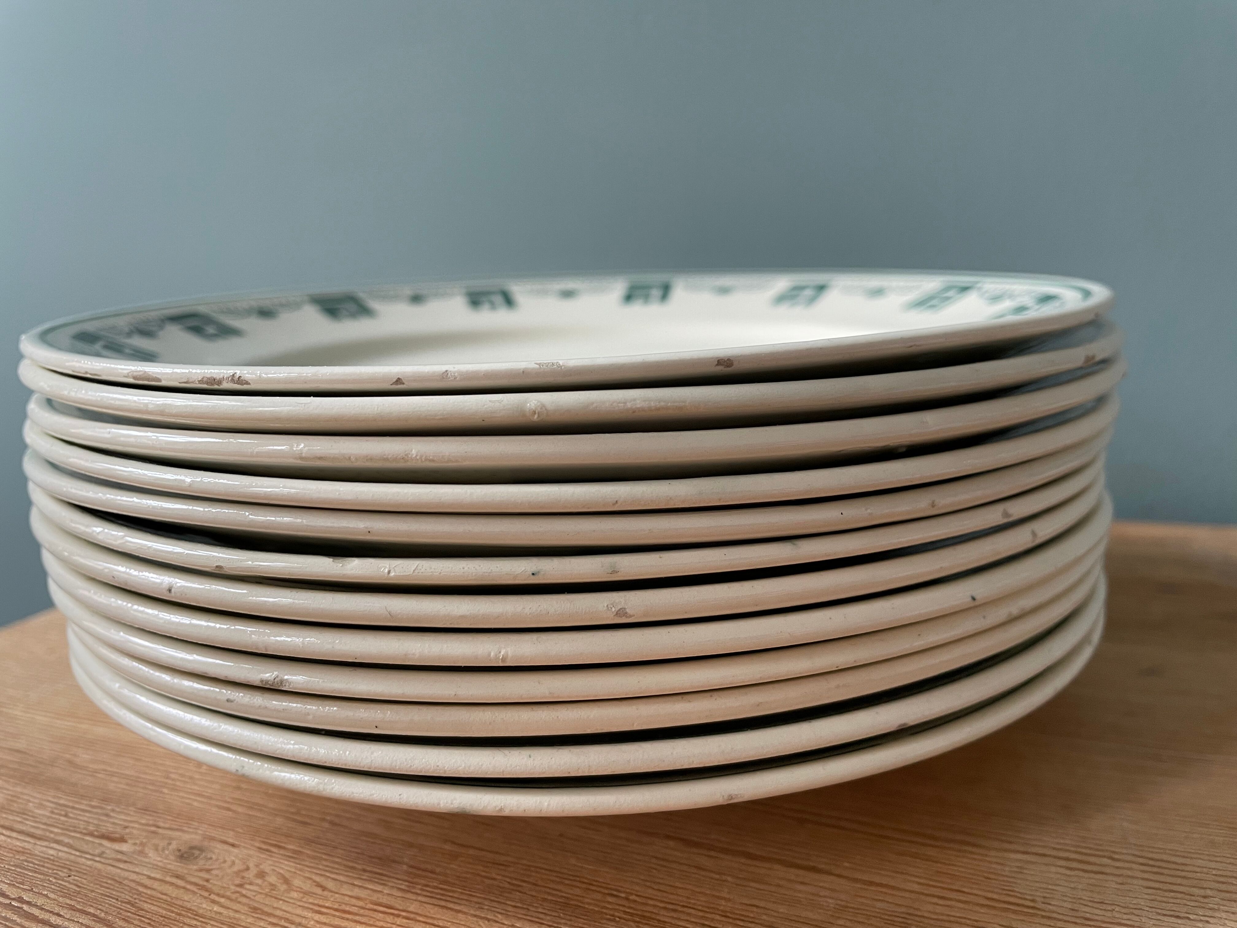 Set of 12 Art Deco plates signed Keller and Guérin Lunéville, model Lucas